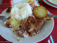 Peru - local food: Guinea Pig with rice and potato